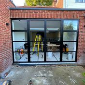 Smarts Heritage French doors and matching sidelights in black ali